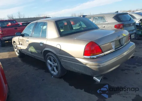 2003 Ford Crown Victoria Lx z USA, uszkodzony, nr VIN 2FAFP74W03X151235